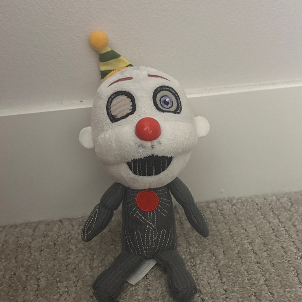 Whimsical Gray and White Clown Plush Toy